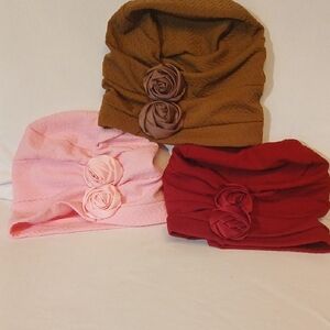 Set of Three Floral Hats in Pink, Brown, and Red
